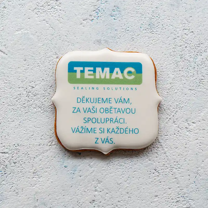 Firemní reklamní perníček s logem TEMAC a textem poděkování